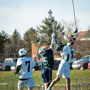 JV Lacrosse players vie for the ball